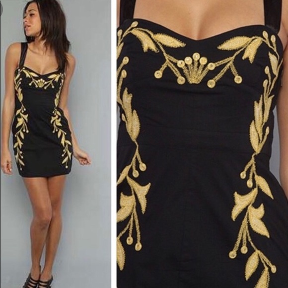 gold and black mini dress